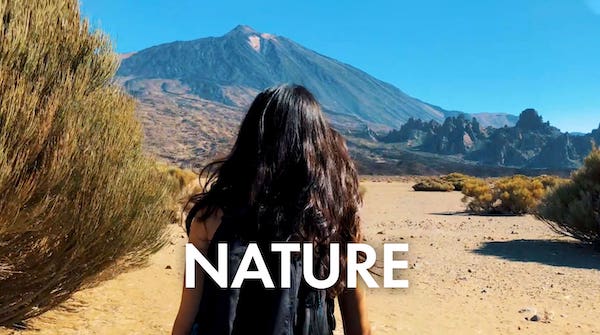 girl walks on the volcano teide